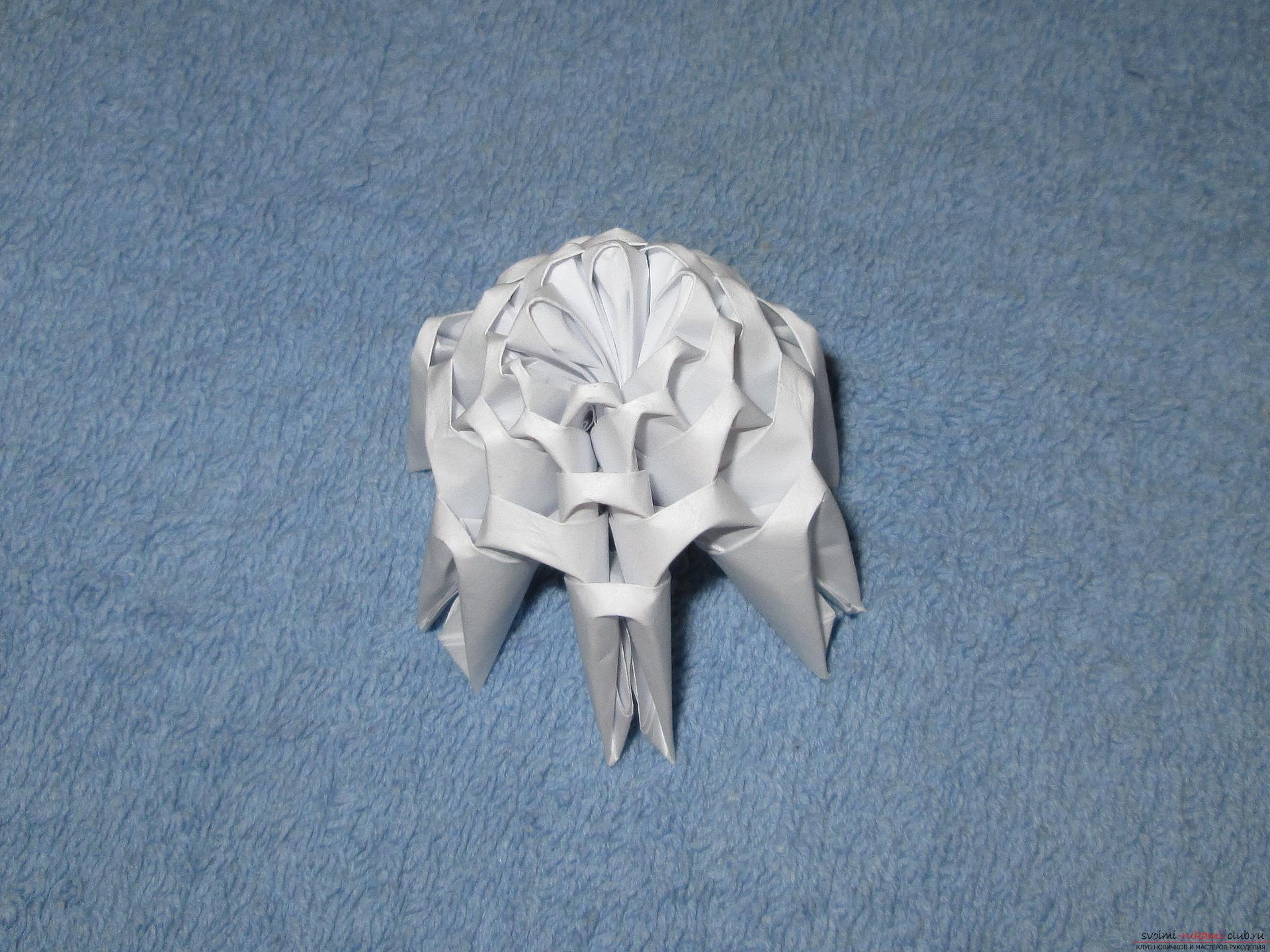 Если вы любите собирать модульное оригами, этот мастер-класс по созданию дельфина из бумаги для вас.. Фото №3